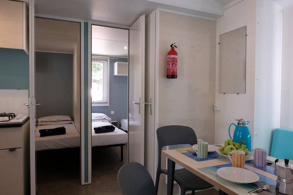 Foto 2 von 30: Camping Iscrixedda Mobilehome Happy Premium für 7 Personen