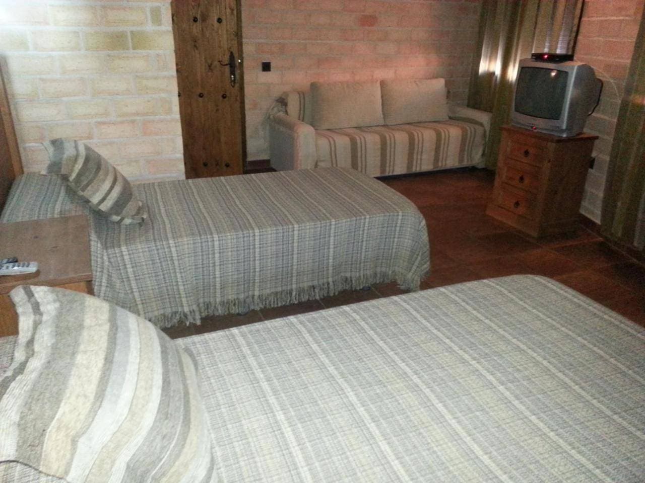 Foto 12 von 27: Quadruple Room