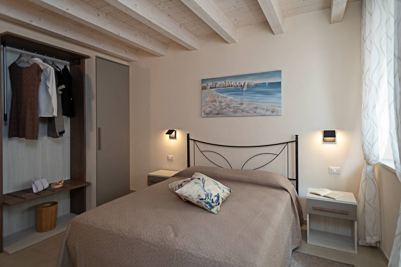 Foto 5 von 36: Regarda - Residenza Gj - piano T moderno bilocale con terrazza panoramica