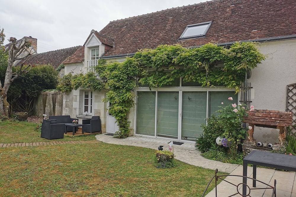 Detached duplex vacation rental for rent surrounded by wisteria 1