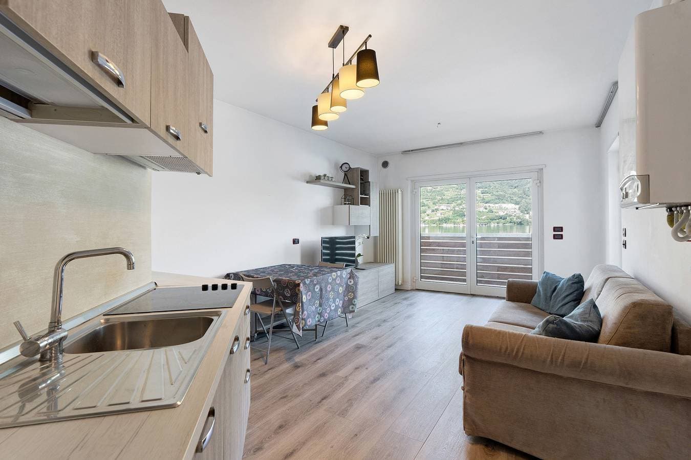 Foto 7 von 27: Apartment 'Valsugana D’incanto' mit Seeblick, privater Terrasse und Gemeinschaftsgarten