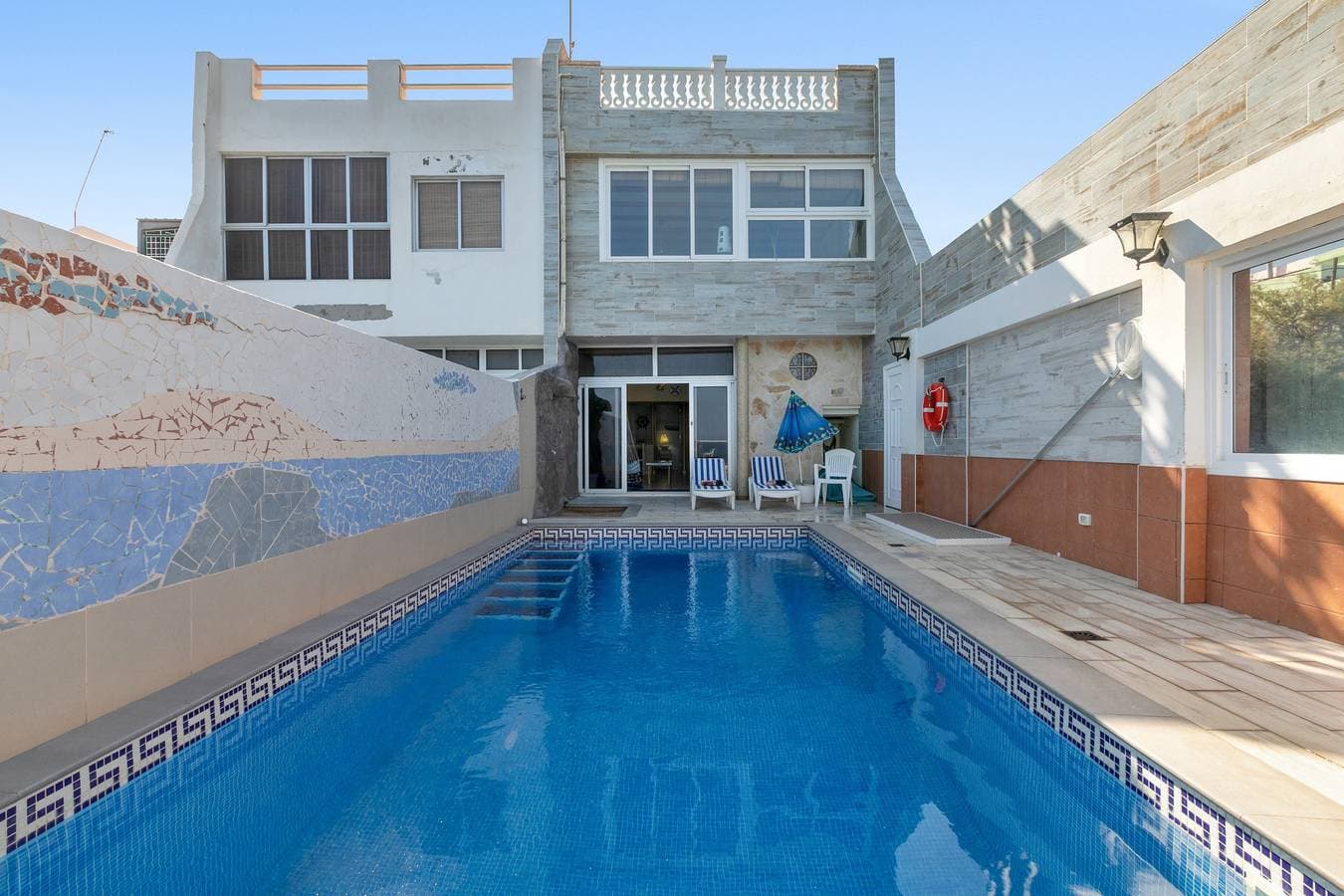 Foto 3 von 35: Ferienhaus 'Seaside House mit beheiztem Pool', Meerblick, WLAN & Klimaanlage