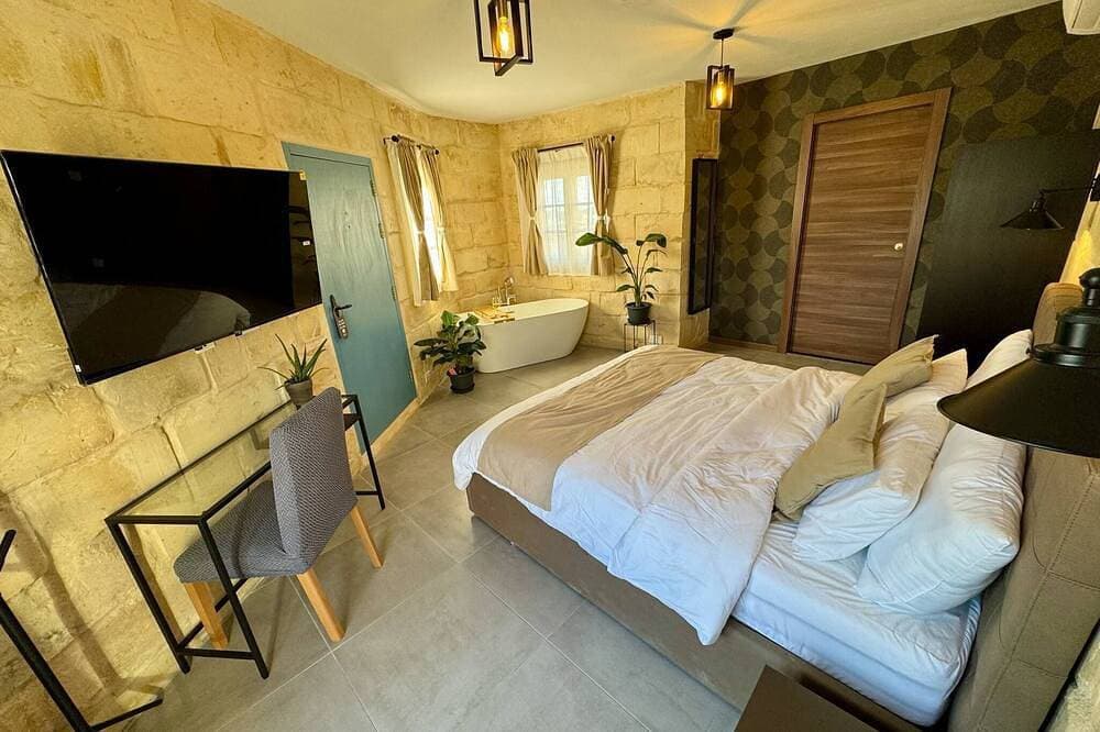 Foto 4 von 16: Kappella Boutique - Zimmer 1