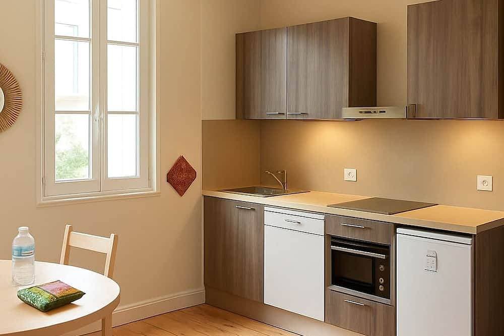 Foto 3 von 21: Studio-Apartment-Nasszelle-Gartenblick-3 étoiles