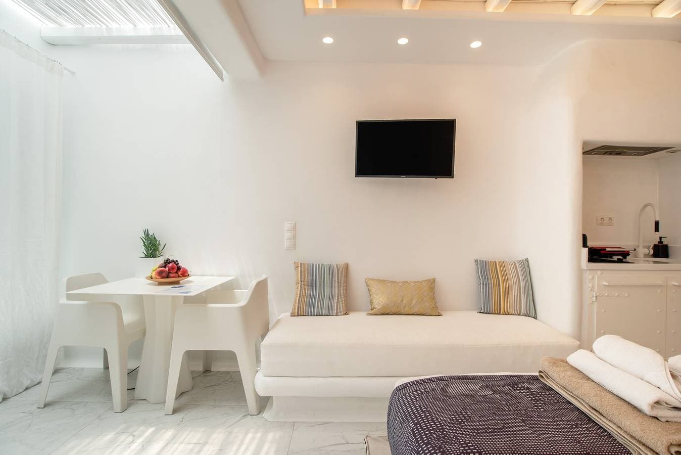 Foto 4 von 31: Apartment 'Narcissus Luxury Suites - Ariadne' mit Meerblick, WLAN und Klimaanlage