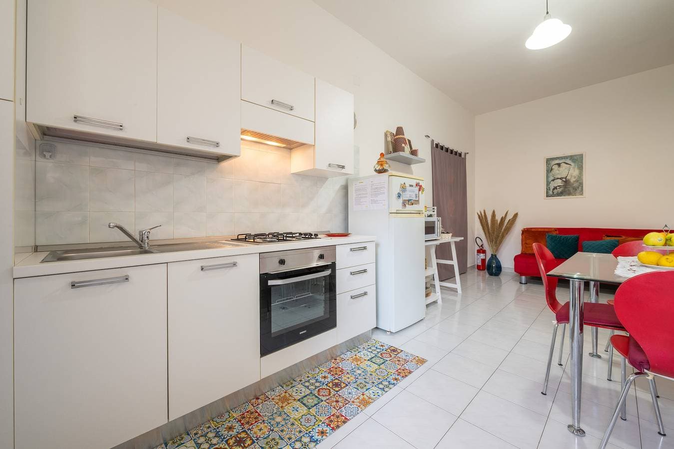 Foto 6 von 28: Ferienwohnung 'Gerani Rossi' mit Gemeinschaftsgarten, Wi-Fi und Klimaanlage