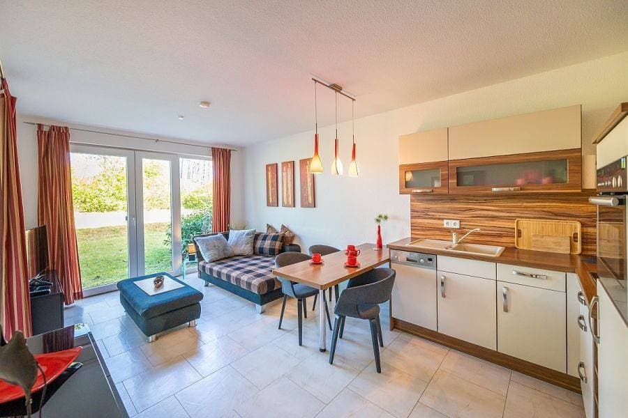Gemütliche Ferienwohnung mit überdachter Terrasse, direkt am Strand 1