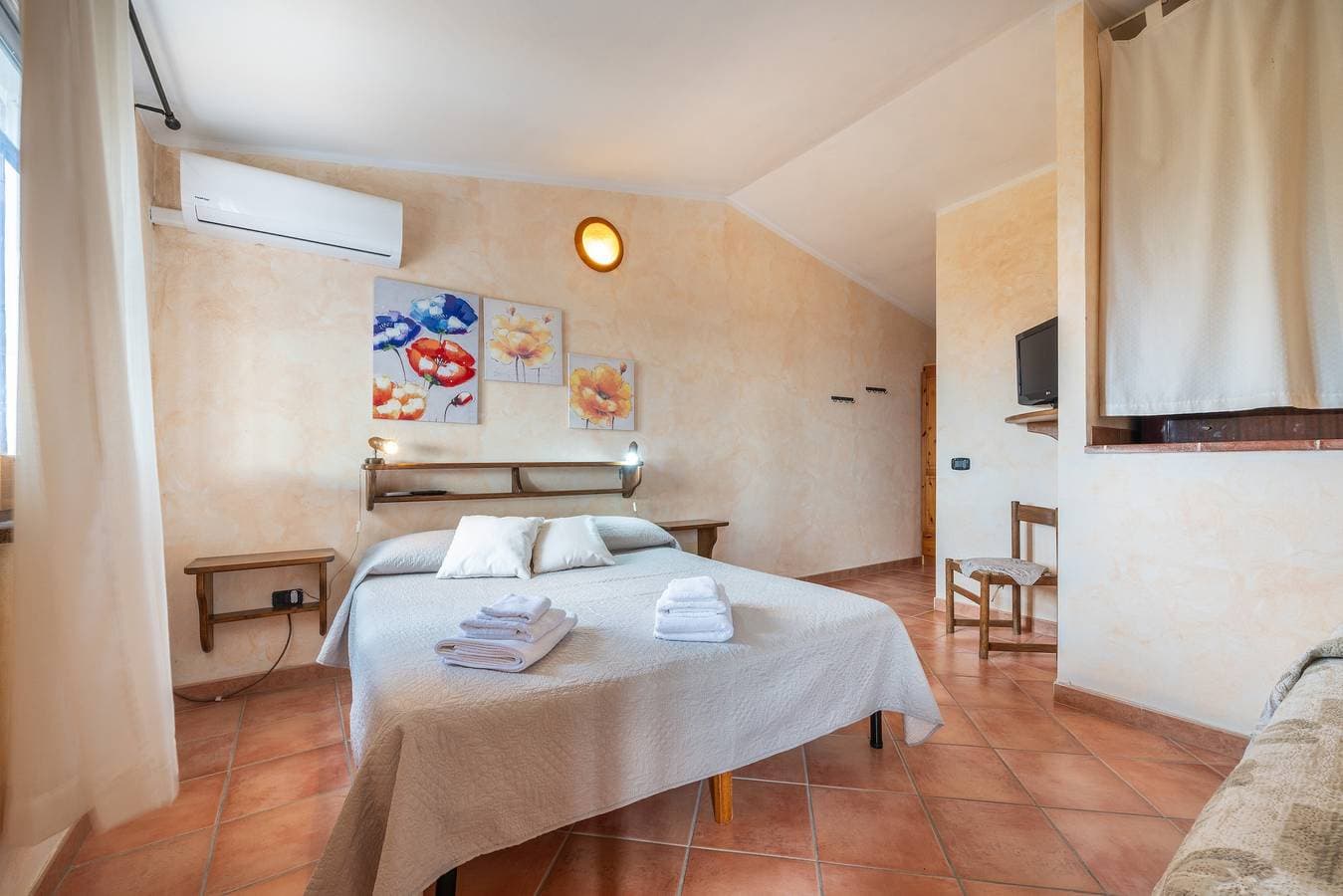 Foto 4 von 25: Ferienhaus 'Brezza Di Mare' mit Meerblick, privater Terrasse und Klimaanlage