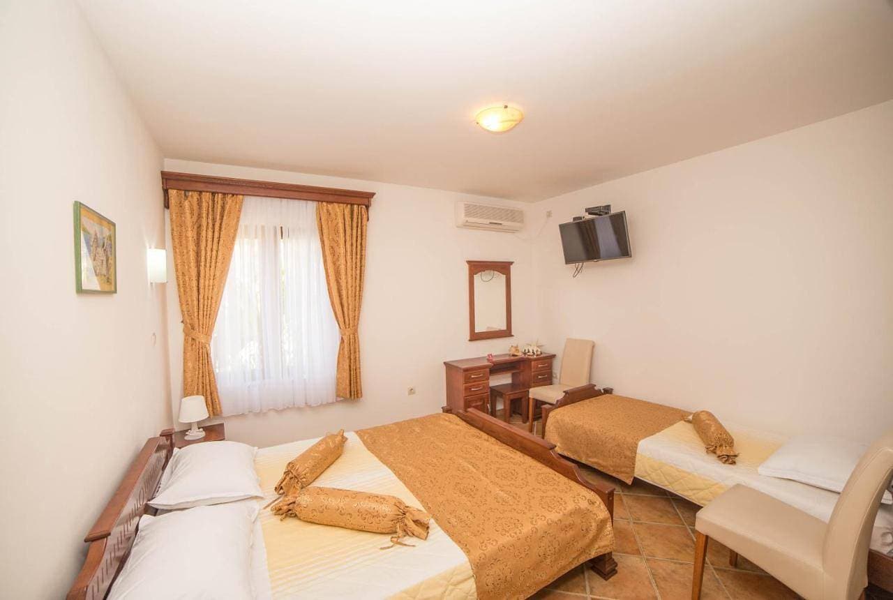 Foto 5 von 12: Quadruple Room with Sea View