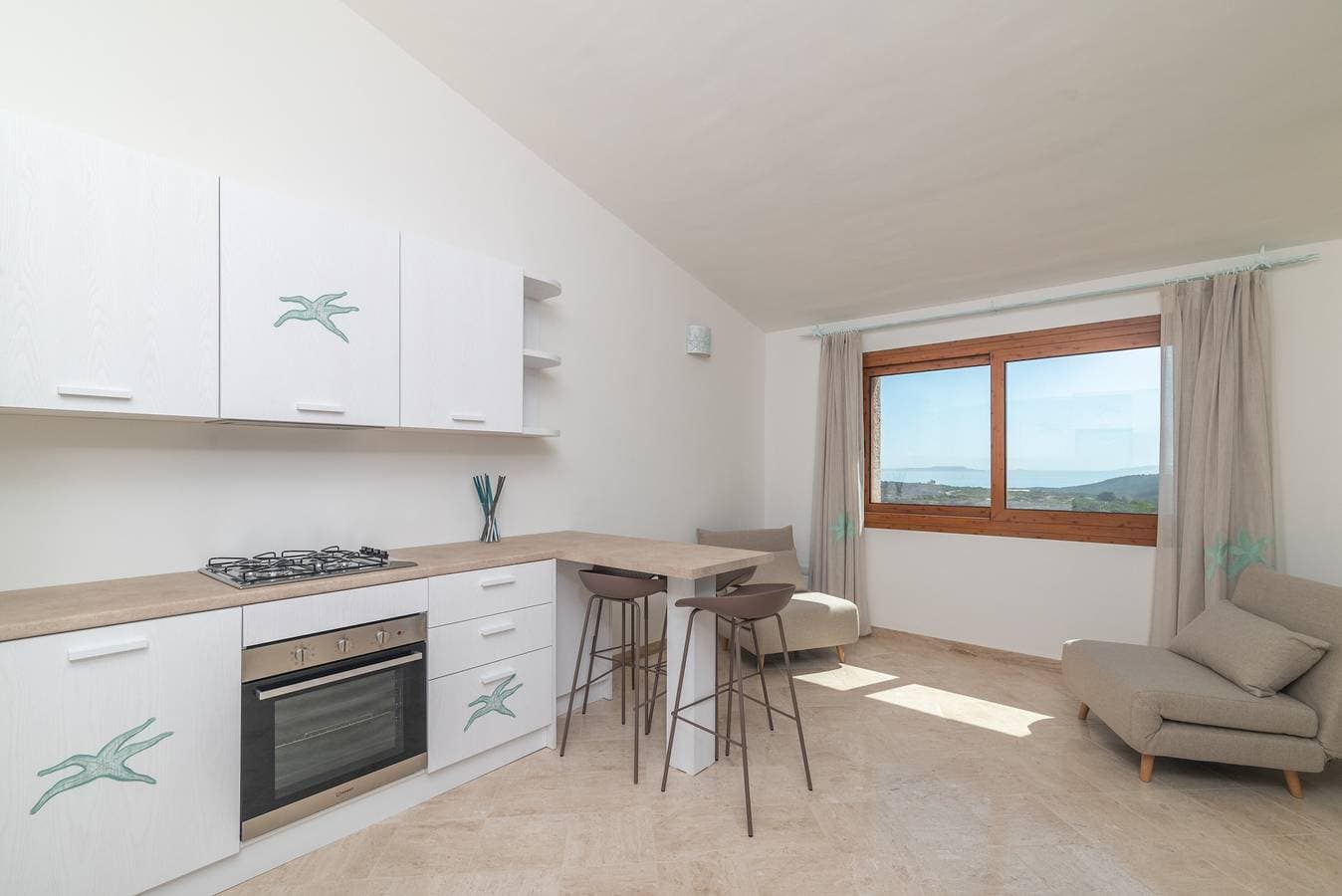 Foto 12 von 26: Ferienwohnung "Stella Maris" mit Meerblick, Gemeinschaftspool und privater Terrasse