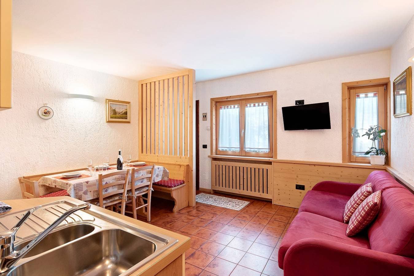 Foto 4 von 21: Ferienwohnung 'Residenz Attila Giardino' mit Bergblick, Gemeinschaftsgarten & WLAN