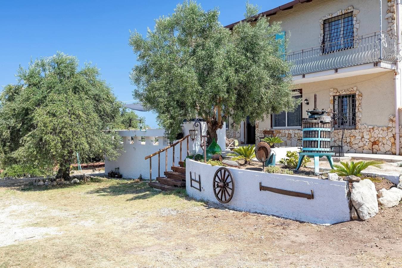 Foto 4 von 38: Ferienhaus 'Il Casale Del Giglio' mit Meerblick, Gemeinschaftsterrasse und privatem Garten