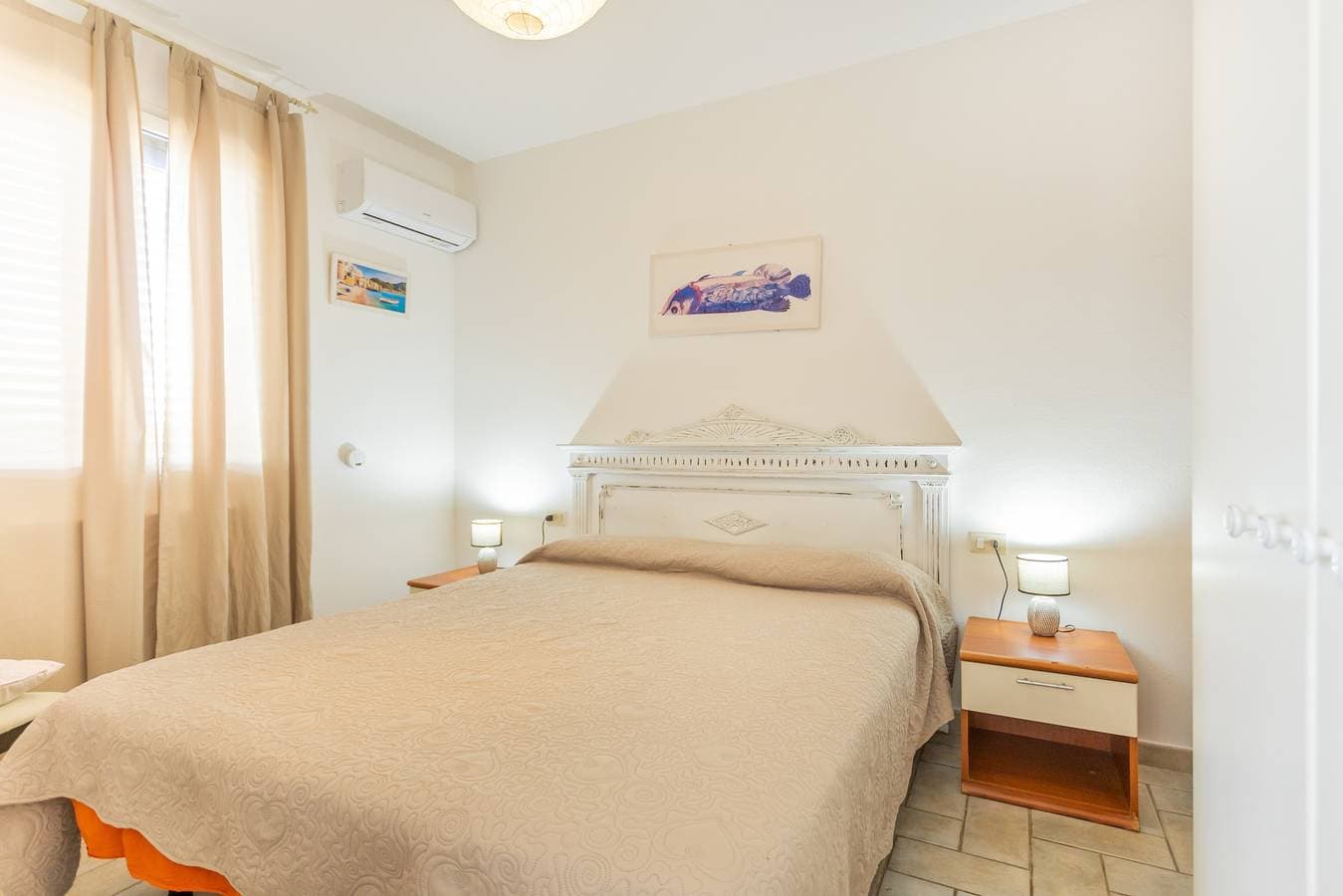 Foto 2 von 24: Ferienhaus 'Am Hafen – nur Schritte vom Meer' mit Meerblick, privater Terrasse & Klimaanlage