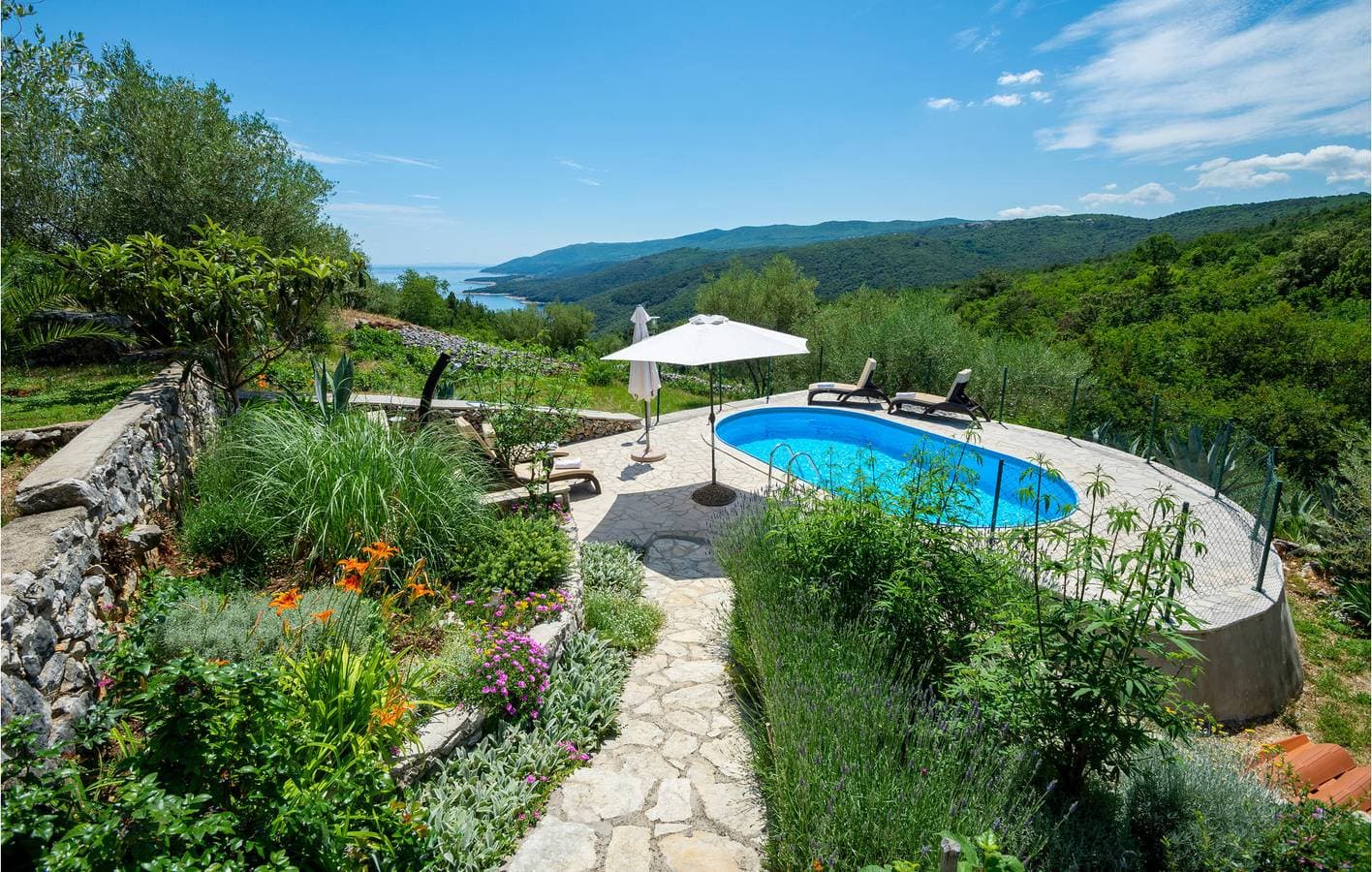 Foto 12 von 40: Apartment mit Meerblick, Pool, Terrasse und WLAN – 1000 m vom Strand entfernt