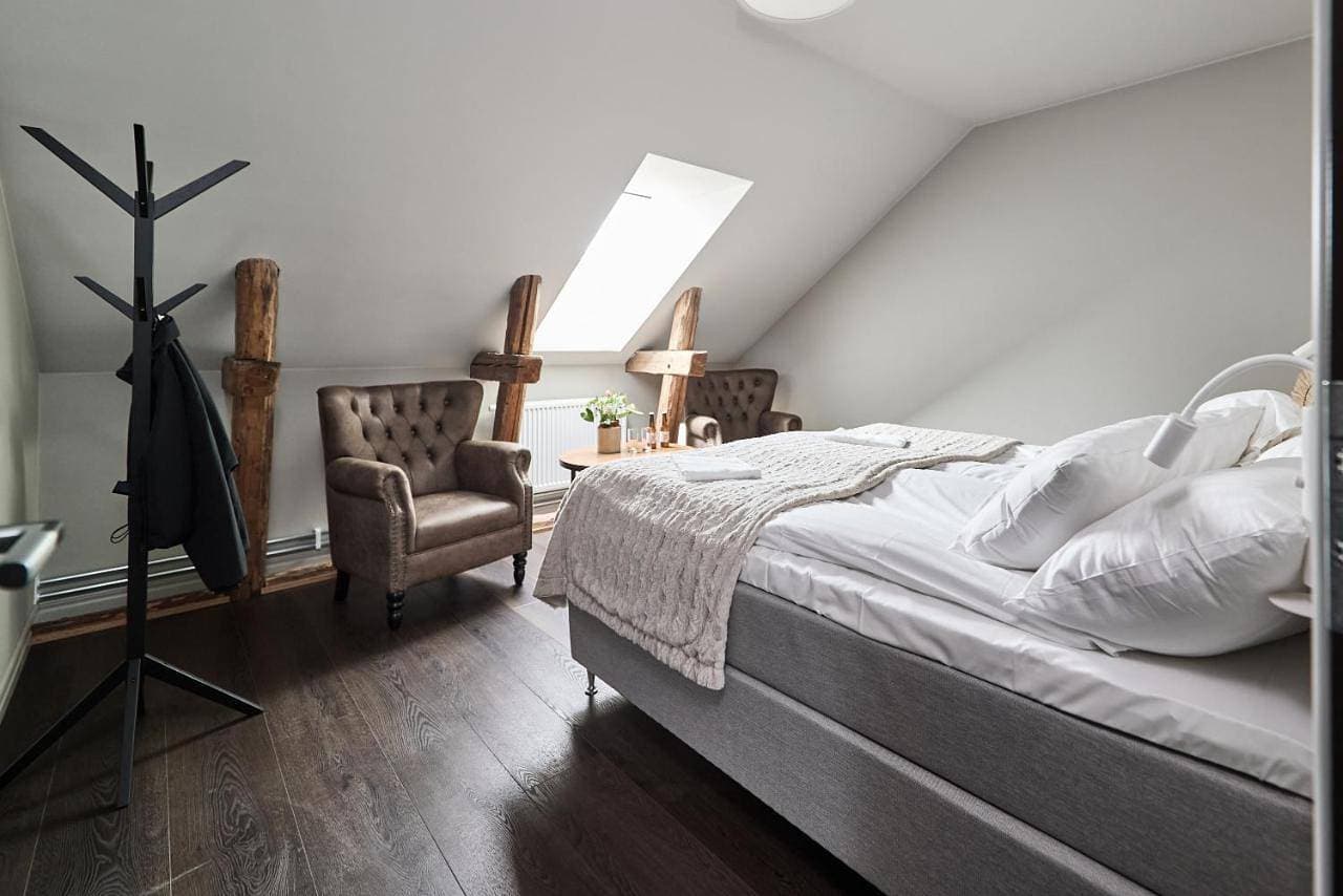Foto 4 von 12: Triple Room with Shared Bathroom
