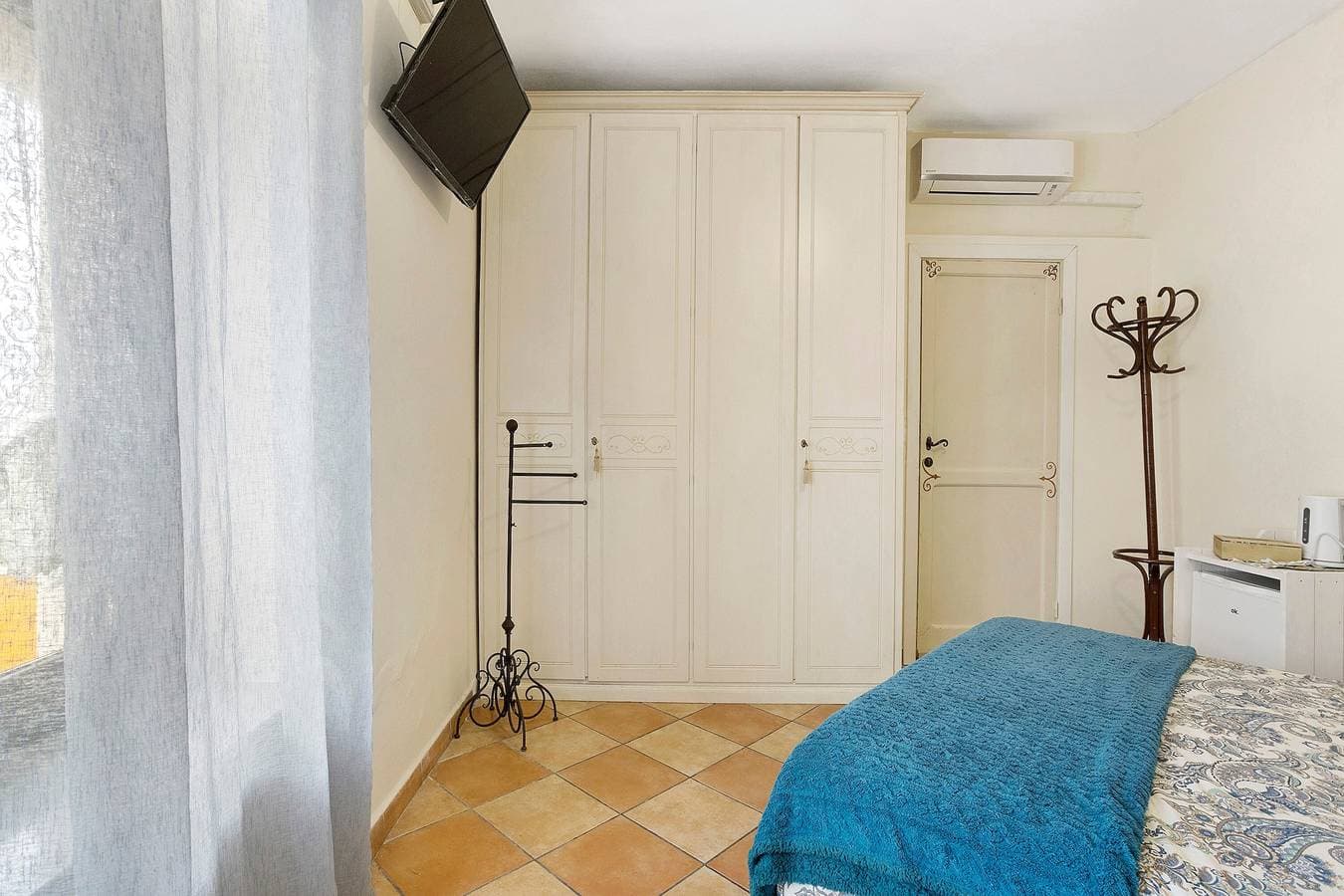 Foto 11 von 40: Zimmer 'Stanza 1' mit Bergblick, WLAN und Klimaanlage