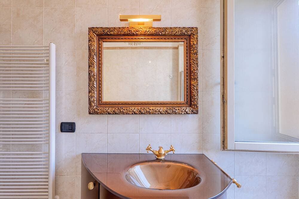 Foto 11 von 26: Palm House apartment in elegant, central setting, a few steps from the sea.