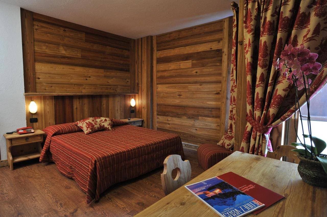 Foto 2 von 11: Quadruple Room