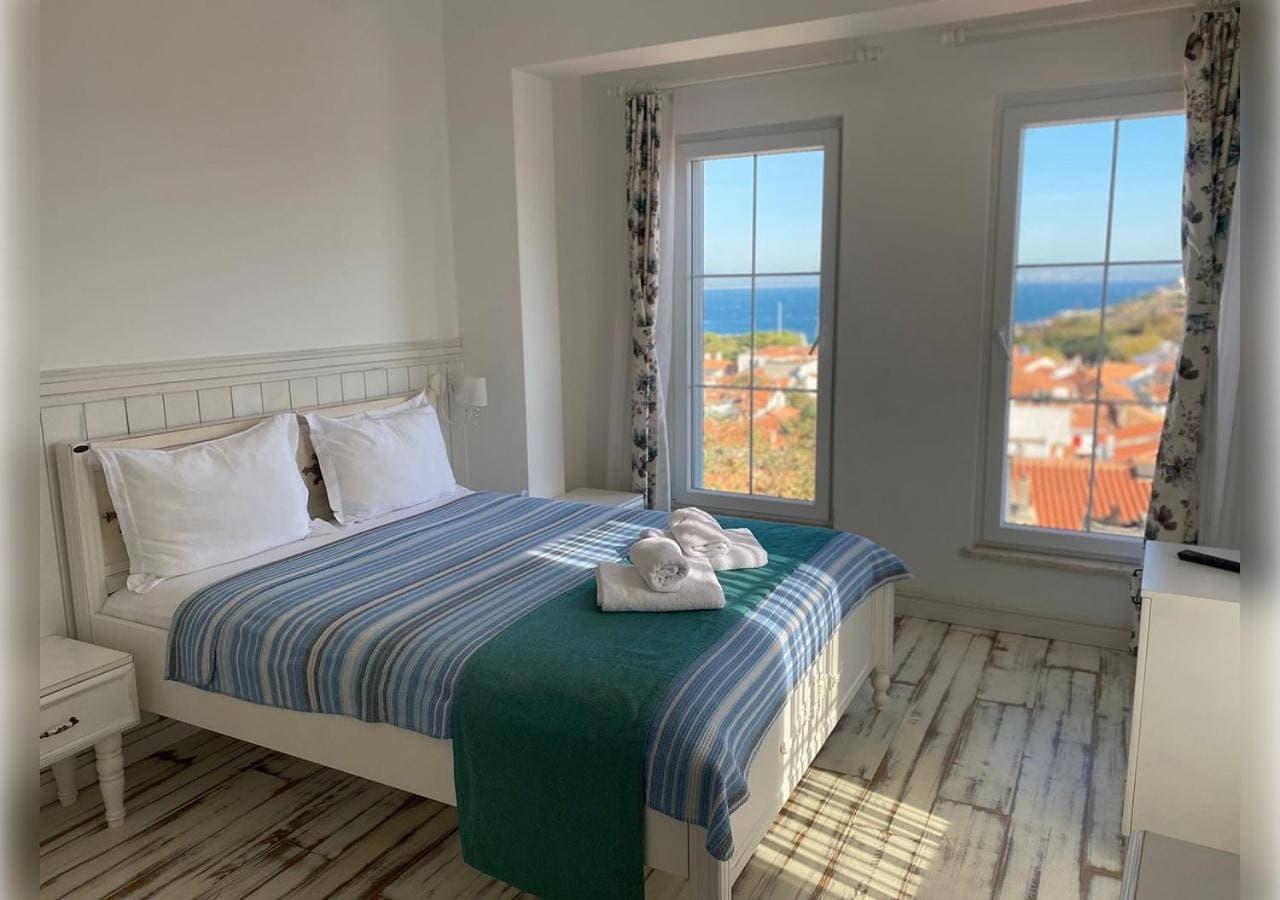 Foto 6 von 10: Deluxe Triple Room with Sea View