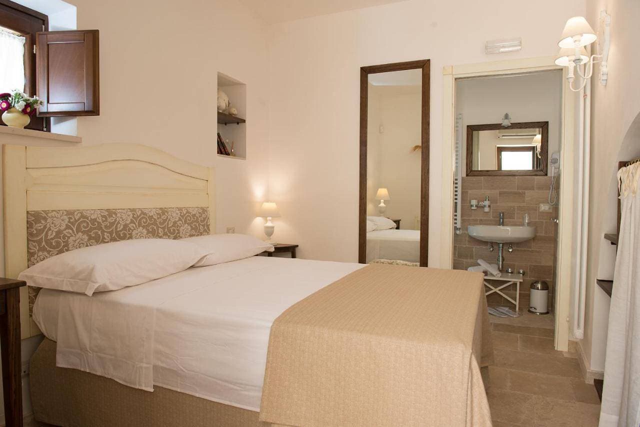 Foto 6 von 12: Double Room with Private Bathroom