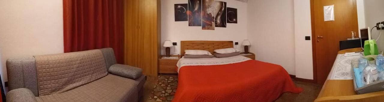 Foto 9 von 9: Triple Room with Garden View