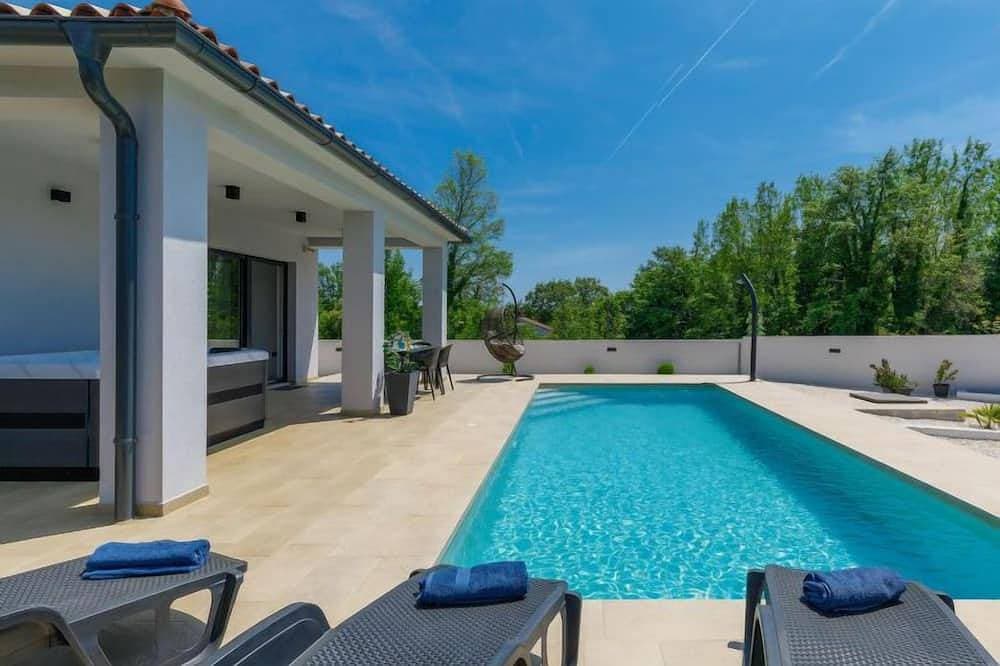 Ferienhaus Vine 1