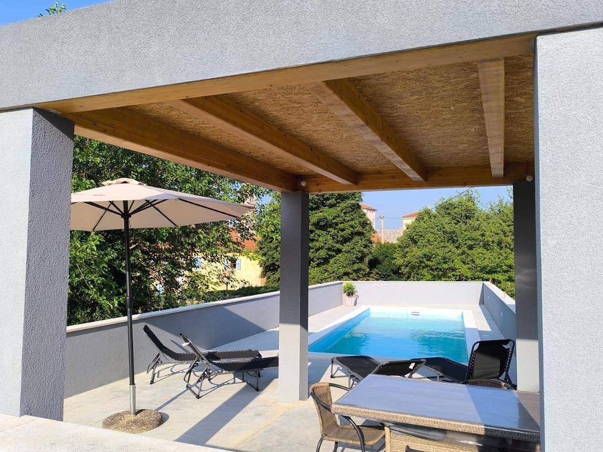 Foto 4 von 47: Three-Bedroom Apartment with Balcony