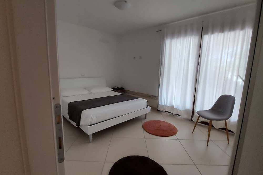 Foto 10 von 30: Villa Luigi_Poggio dei Pini: Unterkunft in einer Villa mit Parkplatz und Wallbox