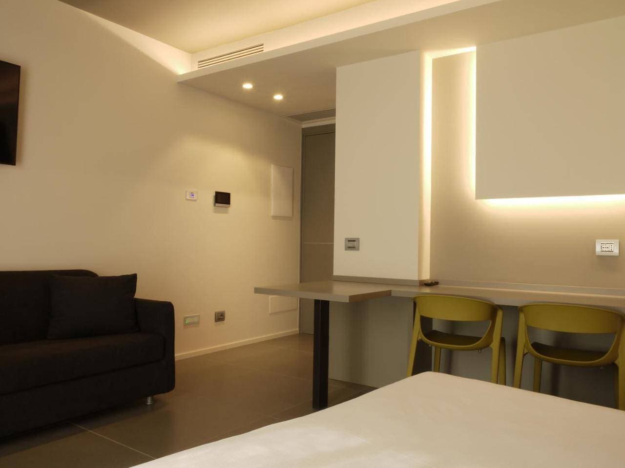 Foto 7 von 32: Triple Room with Balcony