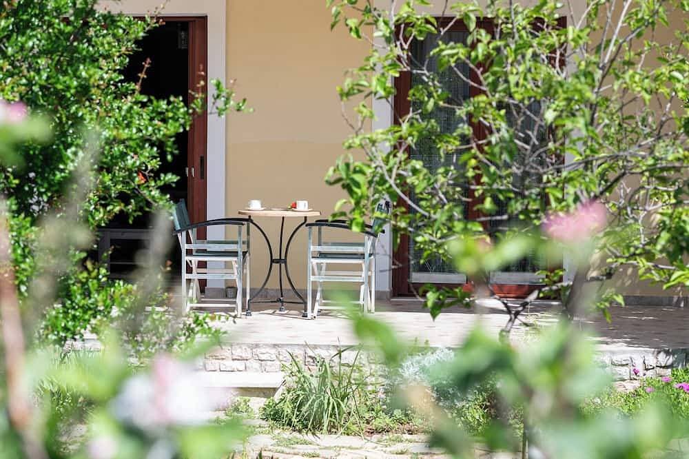 Familienhaus mit sonnigem Gartenblick 1