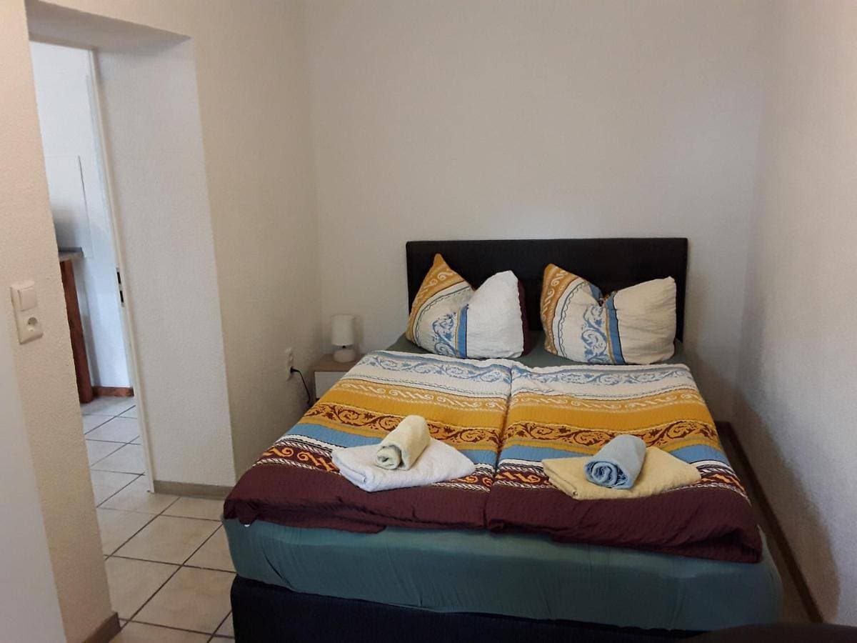 Foto 2 von 8: Triple Room with Bathroom