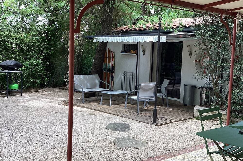 Foto 9 von 9: Studio Avec Terrasse et Pergola Dans Propriété Calme et Sécurisée