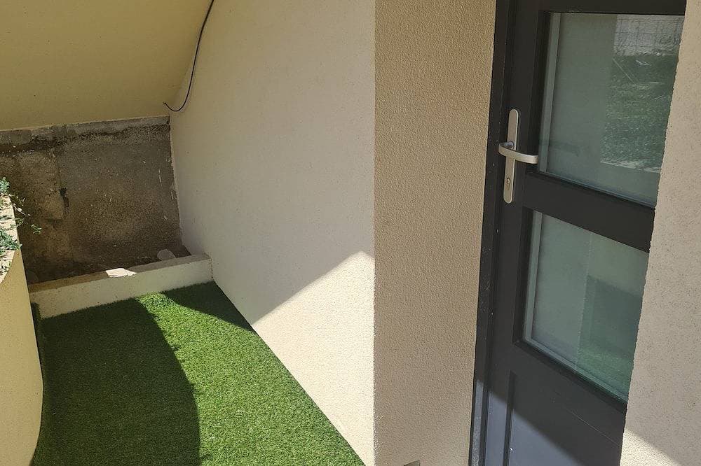Foto 4 von 7: One-Bedroom Apartment