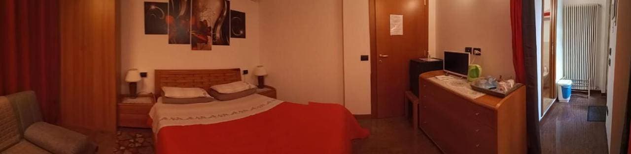 Foto 8 von 9: Triple Room with Garden View
