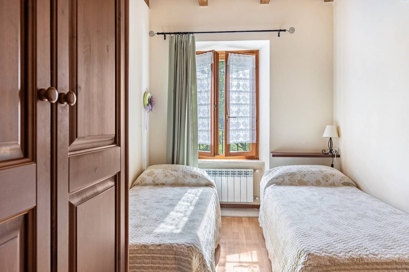 Foto 12 von 33: Ferienwohnung 'Appartamento Trilocale' mit gemeinsamer Terrasse, gemeinsamem Garten und WLAN