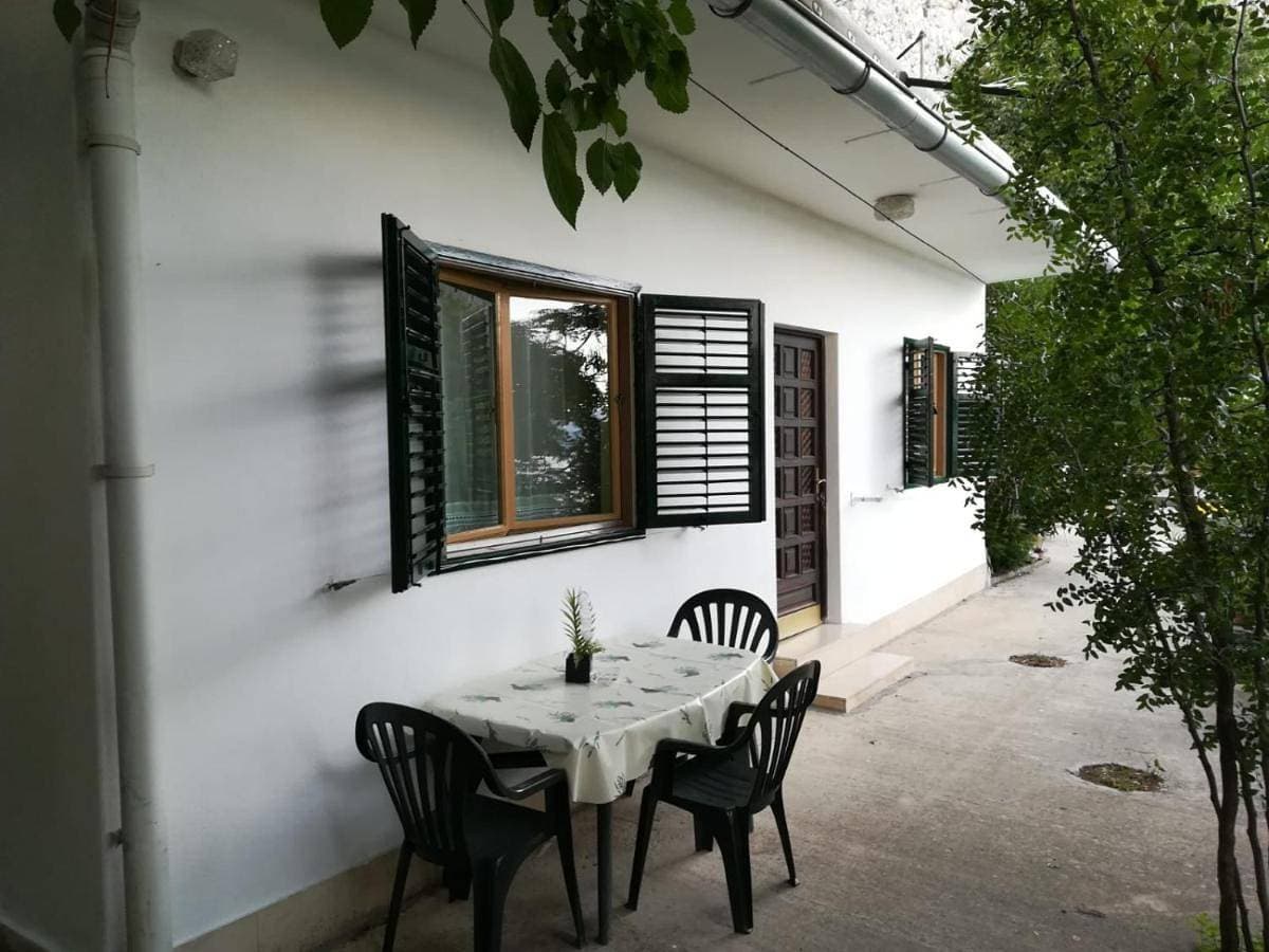 Apartments with a parking space Omis - 15830 1