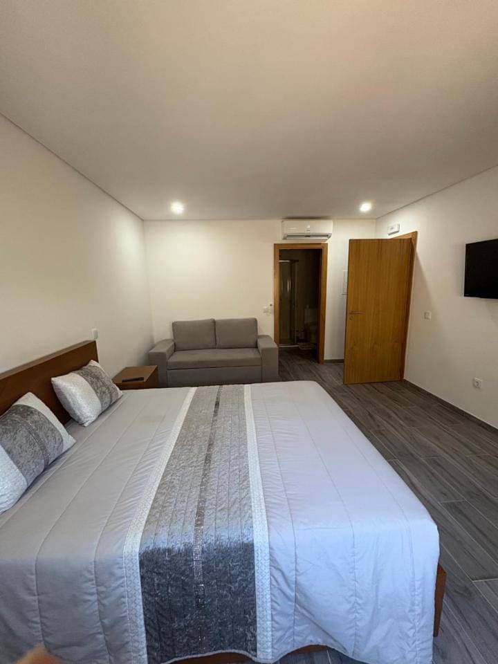 Foto 11 von 16: Double Room with Private Bathroom