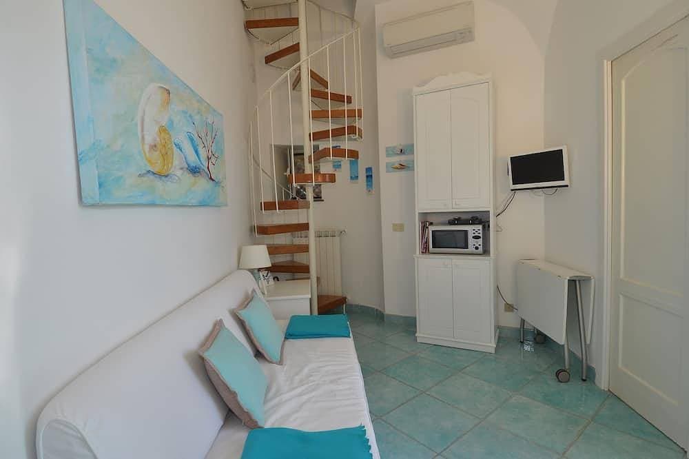 Foto 12 von 27: Romantic cottage, wide terrace overlooking the sea.
