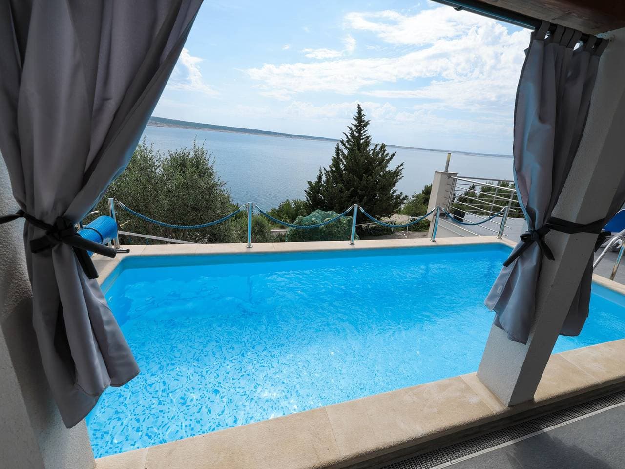 Foto 10 von 60: Luxusapartment mit beheiztem Pool in Starigrad