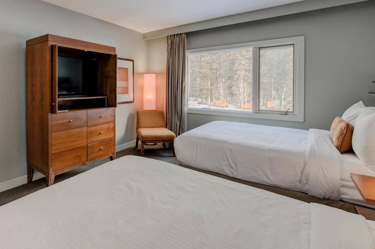 Foto 8 von 11: Standard Room with Two Double Beds