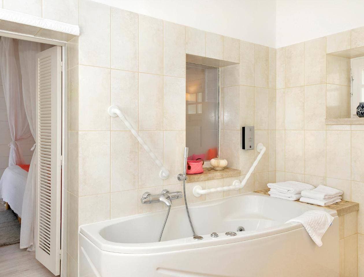 Foto 8 von 10: Quadruple Room with Bath