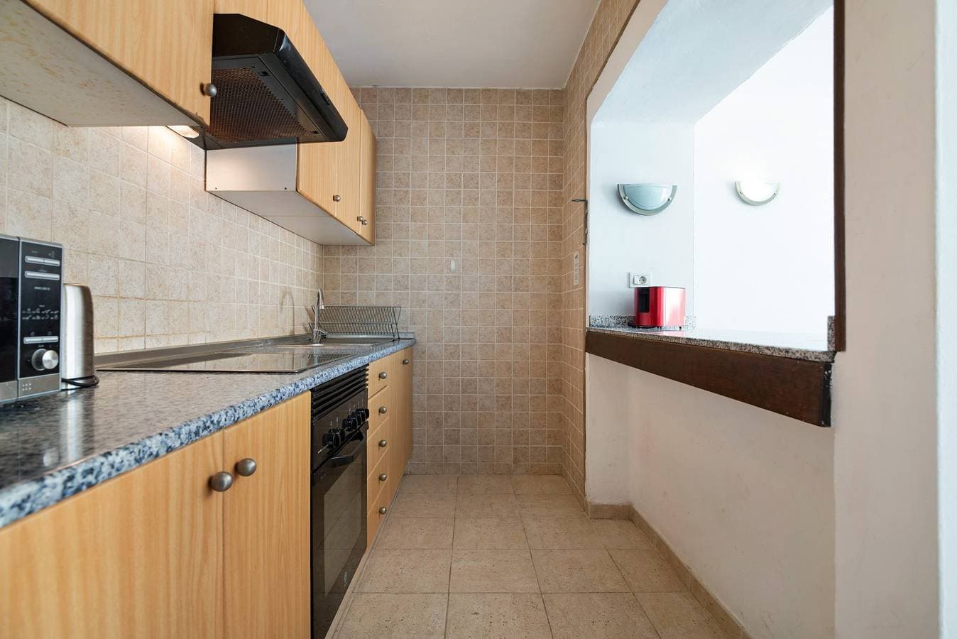 Foto 10 von 27: "Apt 2 Las Palmeras III Lanzarote" mit Meer- und Bergblick, Gemeinschaftspool und privater Terrasse