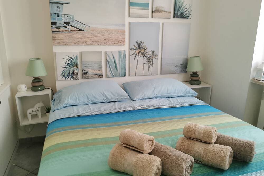 Foto 2 von 30: Ferienwohnung mit Terrasse, A/C, WiFi · 50 m zum Strand