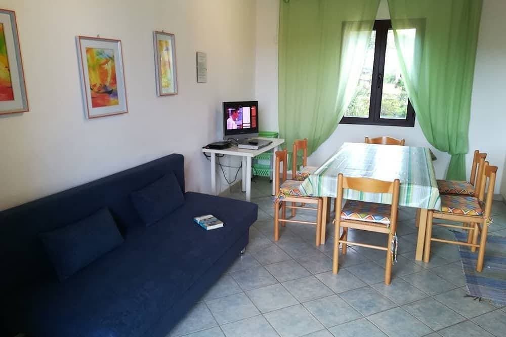 Foto 6 von 30: San Teodoro Wohnung in Residenz mit Schwimmbad