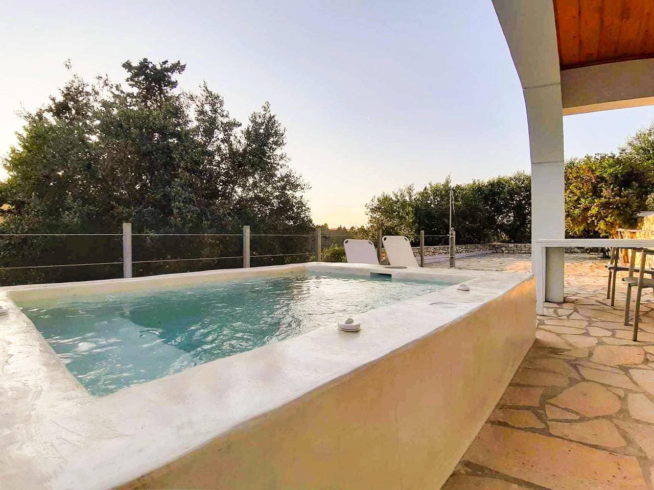 Foto 13 von 20: Kirki's Cozy Getaway - Paxoi Getaway w/ Jacuzzi