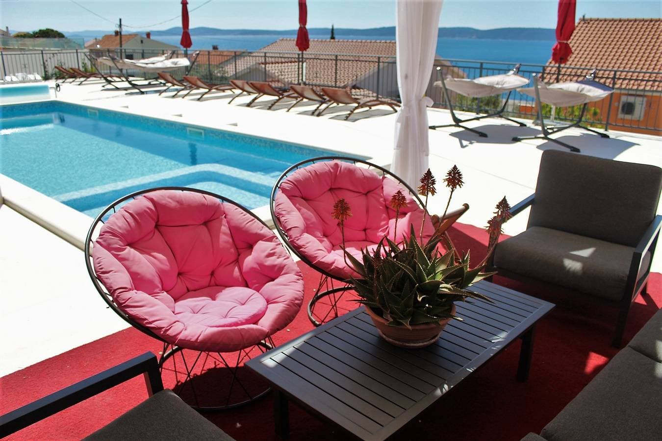 Foto 5 von 26: Apartment am Pool mit Meerblick und geräumigem Sonnendeck a5