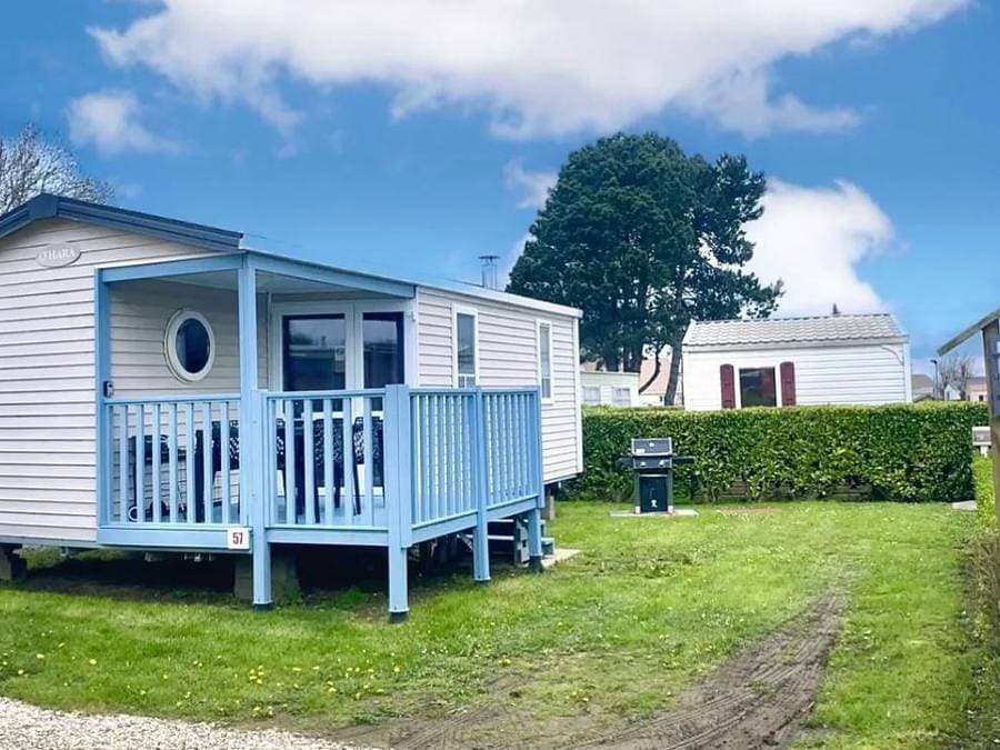 Foto 2 von 25: Camping Le Clos Savoye - Mobilheim 4 personen - 2 Schlafzimmer - TV