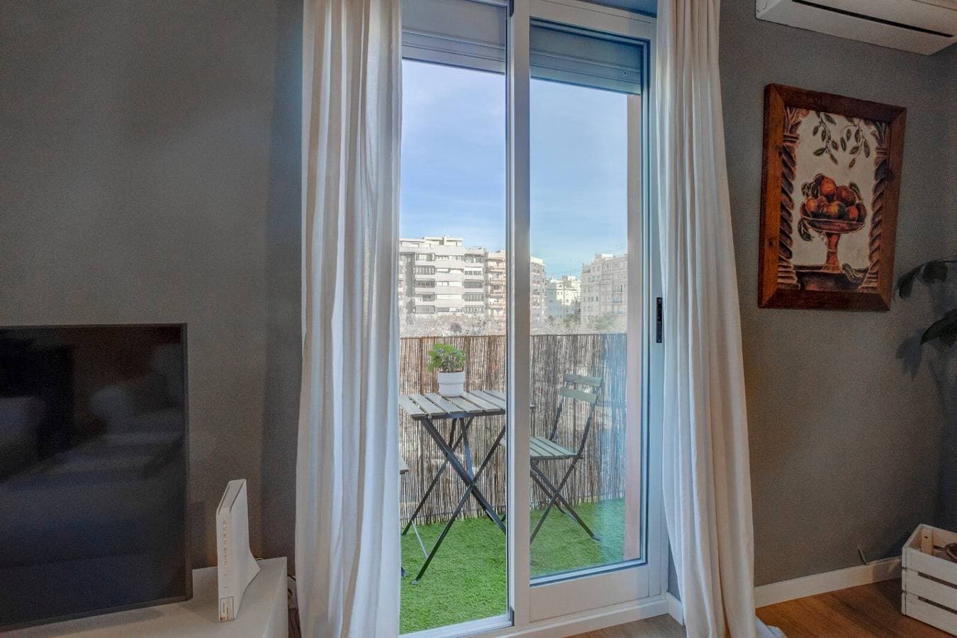 Foto 9 von 20: Apartamento Valencia-living mit Balkon, Klimaanlage und WLAN