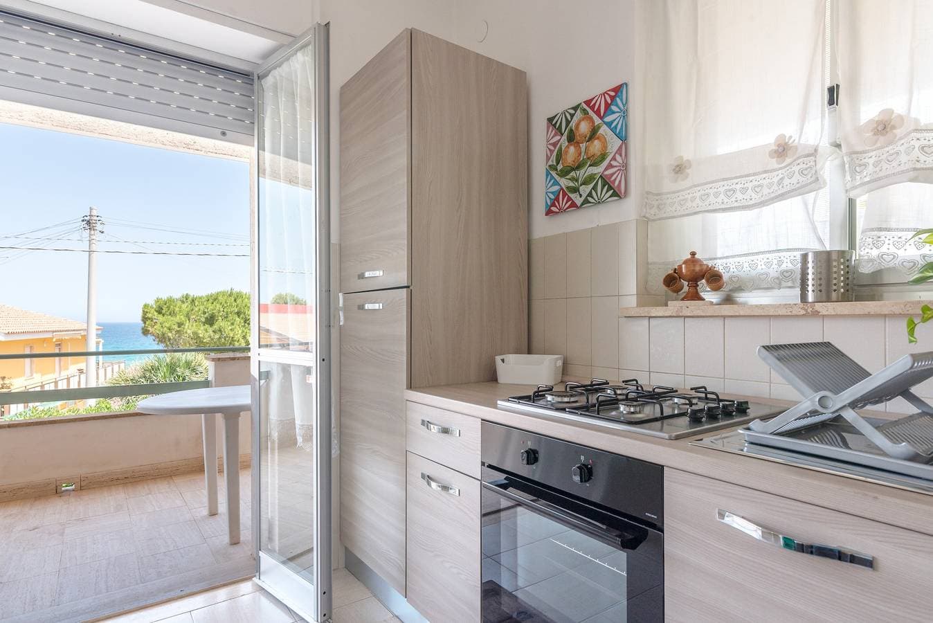 Foto 10 von 38: Ferienhaus „Villa Clara“ mit Meerblick, überdachter Terrasse und Garten