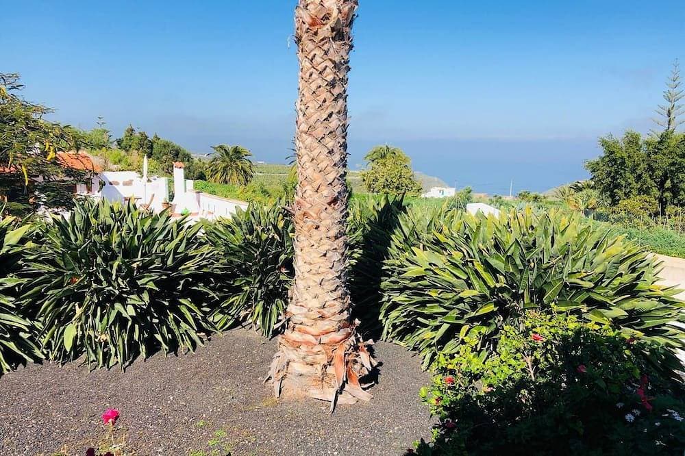 Foto 9 von 21: Cabaña en zona tranquila con bonitas vistas, acogedor estilo y cuidado jardín.